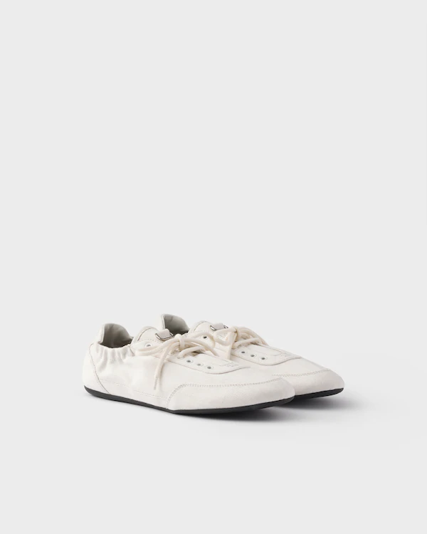 Sneakers in denim a scomparsa Sneakers in denim a scomparsa