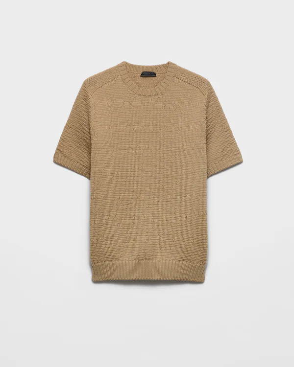 Pullover in lana a maniche corte Pullover in lana a maniche corte